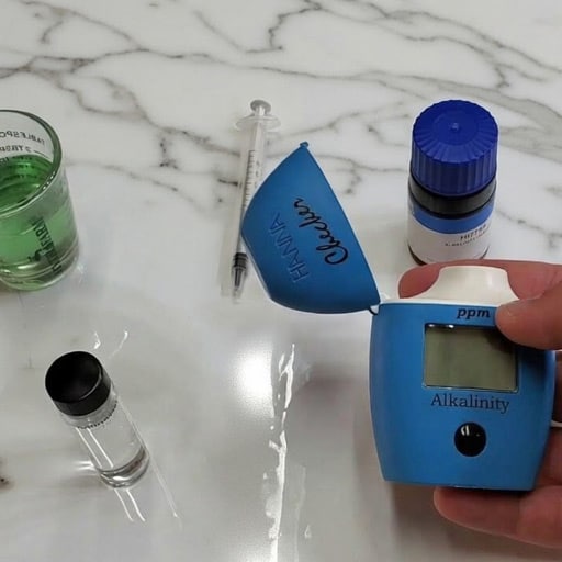 my Hanna HI775 digital alkalinity checker being used to test freshwater aquarium levels